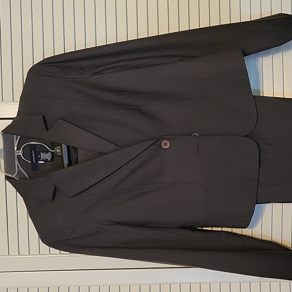 Jones Wear suit grey with blue pinstripes.  Jacket size 8 with size 6 trousers.